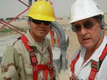 Marko with Outside Plant Antenna Maintenance are about to climb communications tower